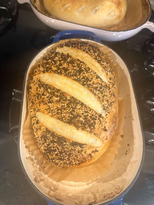 A seeded loaf fresh out of the Dutch oven