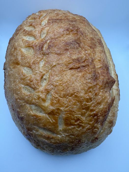 A large scored sourdough boule