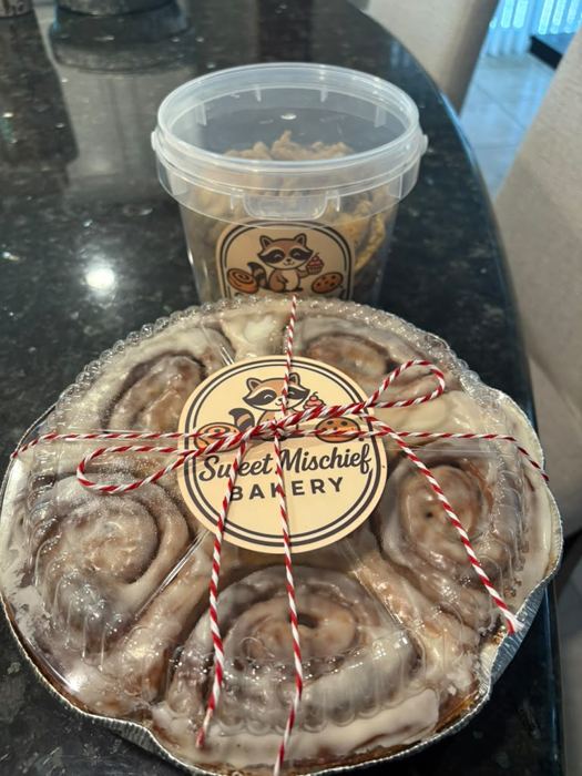 Cinnamon rolls packed with red and white twine